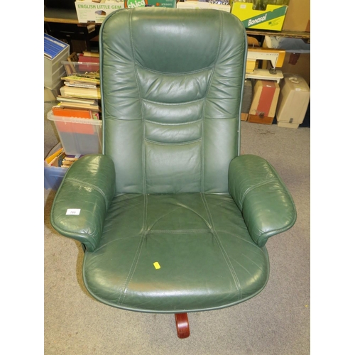 789 - A modern green Stressless style armchair and footstool