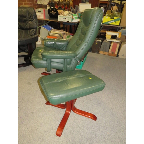 789 - A modern green Stressless style armchair and footstool