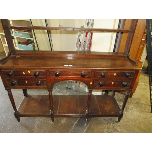 794 - A GEORGIAN OPEN WELSH DRESSER OF SMALL PROPORTIONS, having an arrangement of five drawers, raised on... 