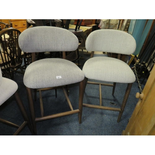 801 - A pair of harlequin upholstered bar/kitchen stools