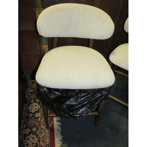 802 - A set of three modern upholstered bar/kitchen stools