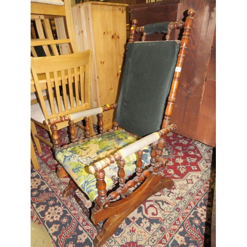 804 - A LATE 19TH /EARLY 20TH CENTURY ROCKING CHAIR