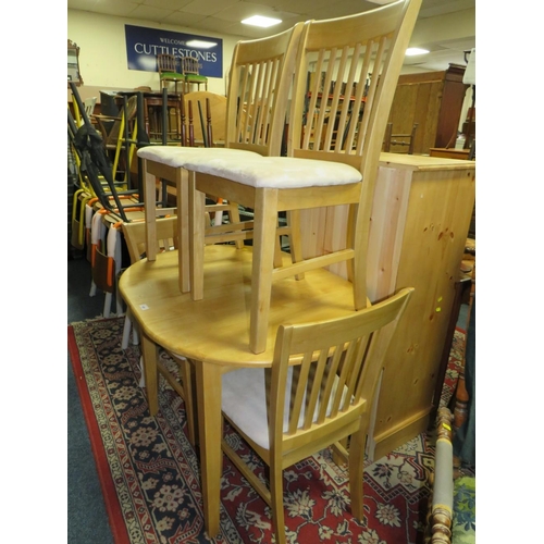 805 - A modern beech style kitchen table and four chairs