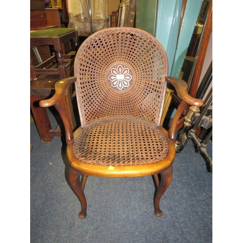 807 - A vintage bergere armchair