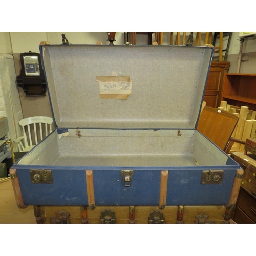 814 - Two vintage banded packing trunks