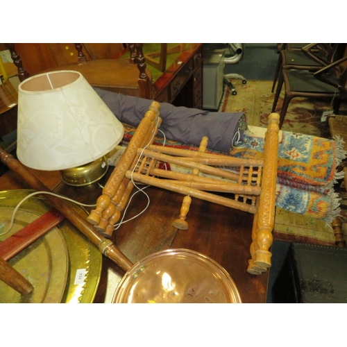 824 - A woollen rug, a hanging tapestry, a brass top table, warming pan, lamp, stool, etc.