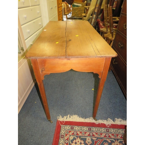 826 - A vintage pine side table on tapered legs W 108 cm