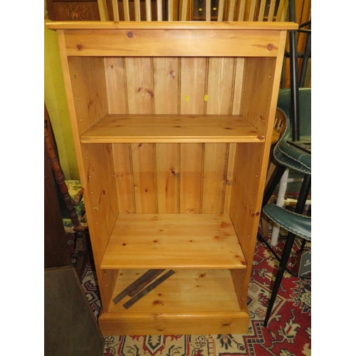 827 - A modern open, honey pine bookcase W 65 cm