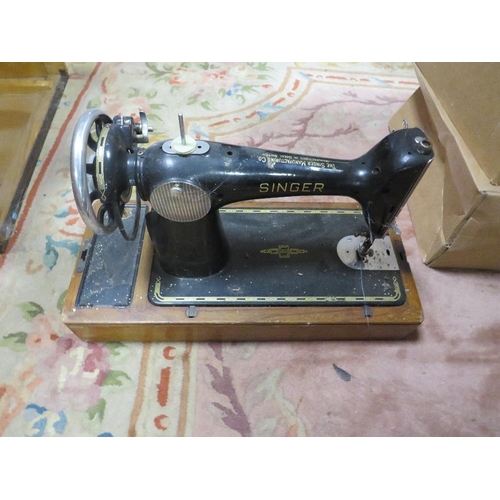 83 - FOUR ASSORTED SEWING MACHINES TOGETHER WITH AN OVERLOCK MACHINE - ALL AS FOUND