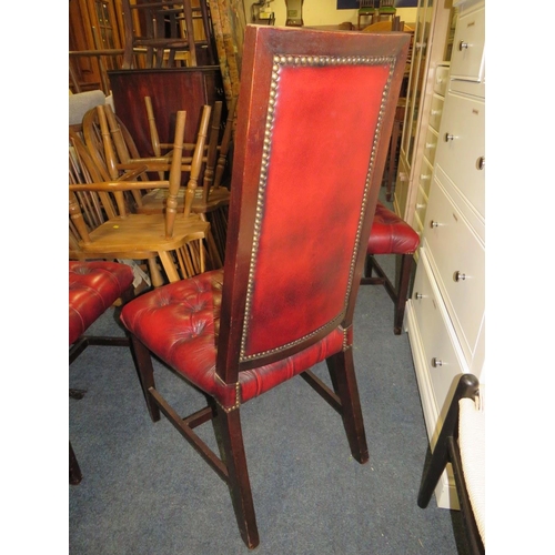 833 - A set of four mahogany reproduction oxblood, red dining chairs