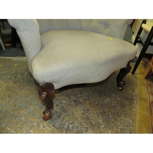 834 - A Victorian mahogany upholstered armchair