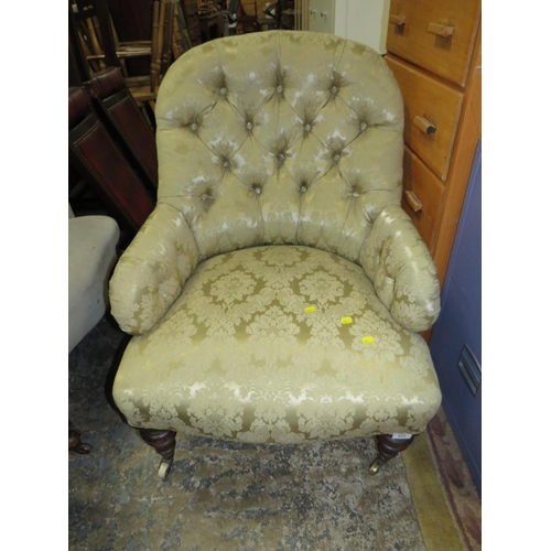 835 - An Edwardian mahogany upholstered armchair