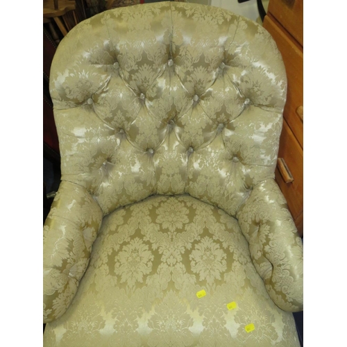 835 - An Edwardian mahogany upholstered armchair