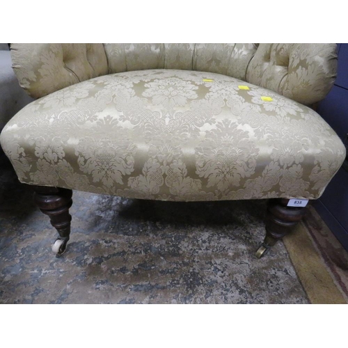 835 - An Edwardian mahogany upholstered armchair