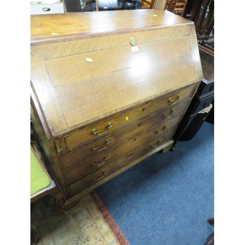 854 - A GEORGIAN OAK COUNTRY MADE BUREAU