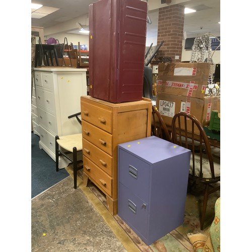 841 - A utility style four drawer chest together with a metal two door cabinet and a metal trunk