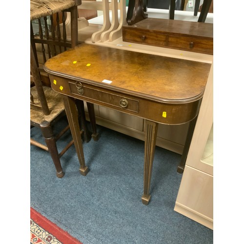 845 - A small walnut console table with single drawer