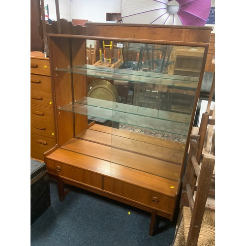 849 - A mid-century teak glazed cabinet with two drawers below W 107 cm