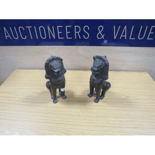 299 - A PAIR OF CAST BRONZE STYLE EASTERN DOGS OF FO TYPE STATUETTES