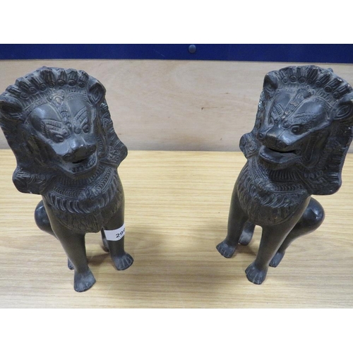 299 - A PAIR OF CAST BRONZE STYLE EASTERN DOGS OF FO TYPE STATUETTES