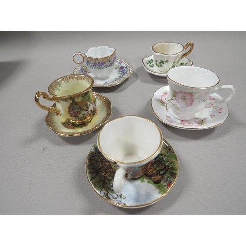 313 - A TRAY OF 20 MINATURE CUPS AND SAUCERS TO INCLUDE WEDGWOOD, LIMOGES ETC