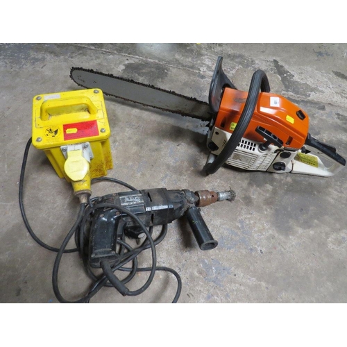 651 - A 110v TRANSFORMER TOGETHER WITH A PETROL CHAINSAW