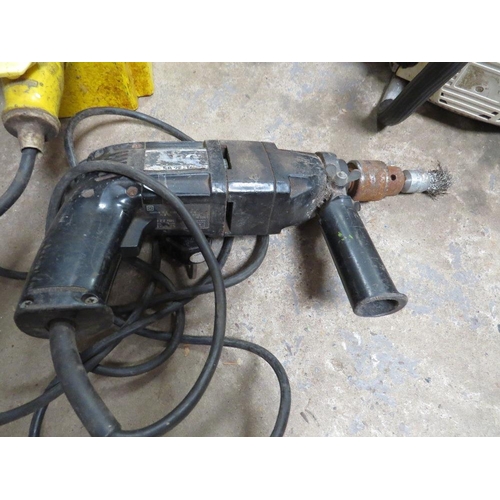 651 - A 110v TRANSFORMER TOGETHER WITH A PETROL CHAINSAW