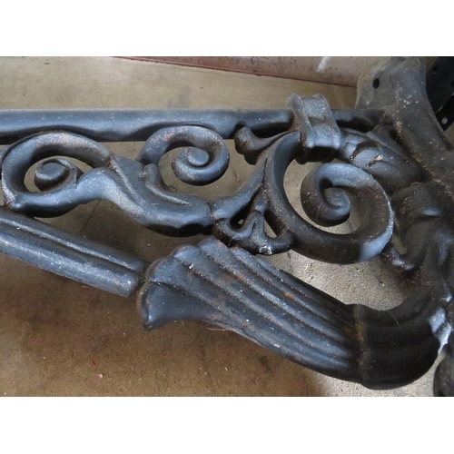 661 - TWO LARGE CAST IRON WALL LIGHTS