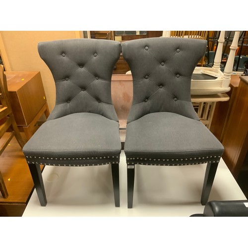 870 - A pair of modern dark grey upholstered dining chairs