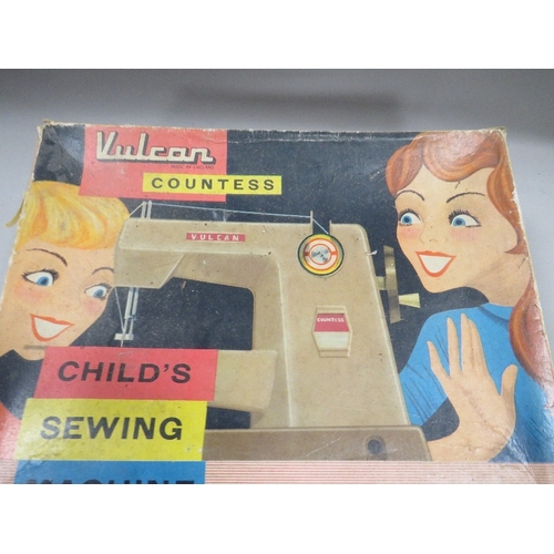 469 - A VINTAGE VULCAN COUNTESS CHILDS SEWING MACHINE IN ORIGINAL BOX