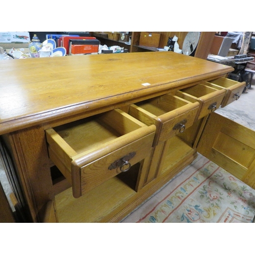 793 - A large and heavy oak serving sideboard W 157 cm