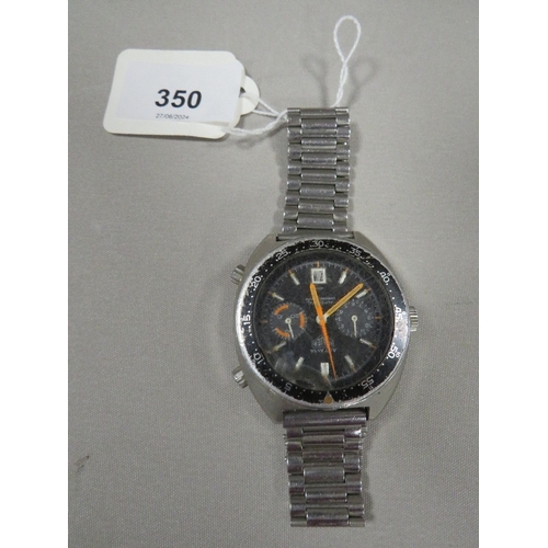 350 - A VINTAGE AUTAVIA HEUER AUTOMATIC CHRONGRAPH WITH TWO SUBSIDIARY DIALS AT 3 AND 9 O'CLOCK DATE WINDO... 