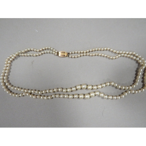 391 - A VINTAGE SIMULATED PEARL DOUBLE STRAND NECKLACE WITH 9ct FASTENER BY CIRO