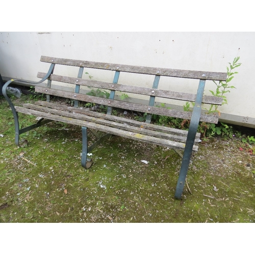 671 - A VINTAGE WROUGHT IRON AND WOODEN GARDEN BENCH