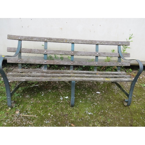 671 - A VINTAGE WROUGHT IRON AND WOODEN GARDEN BENCH