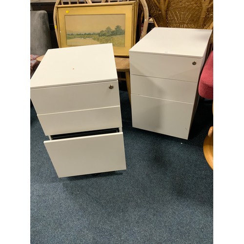 828 - Two modern metal 3 drawer filing cabinets on castors