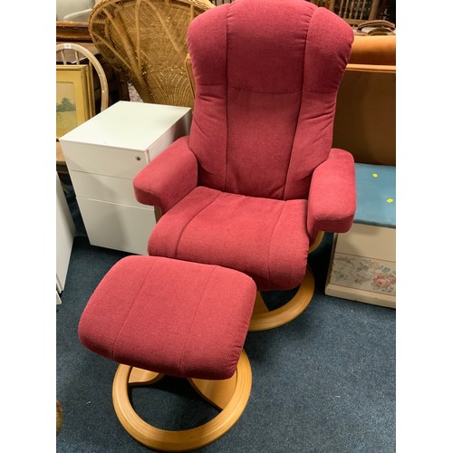 827 - A modern upholstered arm reclining armchair with footstool