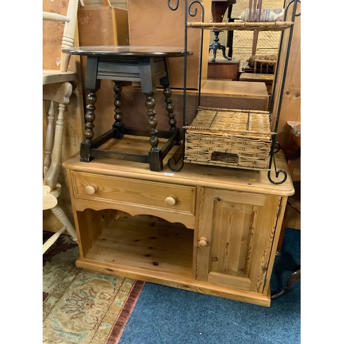 822 - A modern pine TV cabinet together with an occasional table and a wicker cabinet