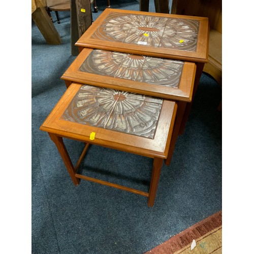 815 - A mid-century teak tile top nest of tables