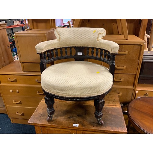 814 - A small Edwardian upholstered tub armchair