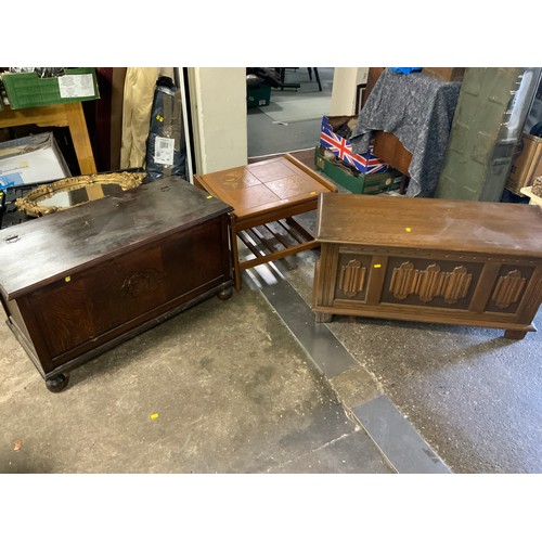 794 - A mid-century tile top teak table together with two oak blanket boxes