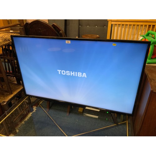 784 - A Toshiba 50 inch flatscreen television with remote