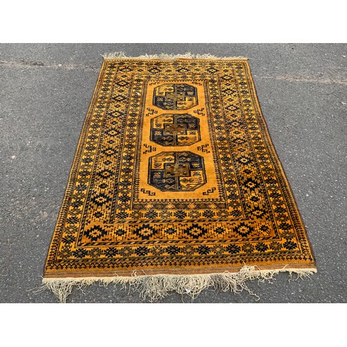 776 - An Eastern woollen rug