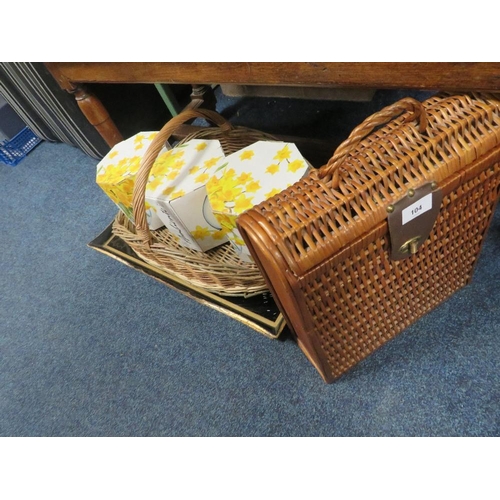 104 - A quantity of sundries to include a wicker three bottle champagne basket