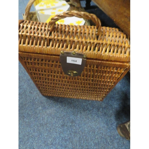 104 - A quantity of sundries to include a wicker three bottle champagne basket