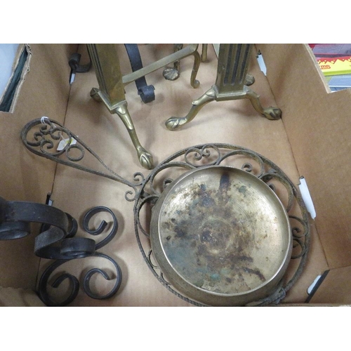 111 - A quantity of metal ware to include candlesticks, fire dogs etc