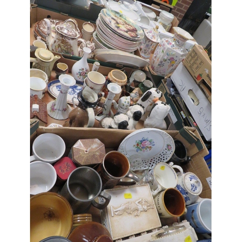 112 - Three trays of assorted ceramics to include plates, Staffordshire style spaniels etc