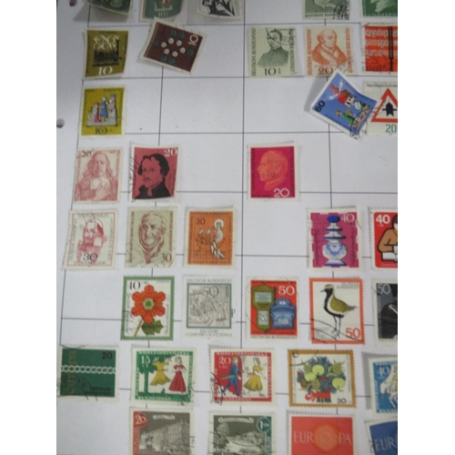 133 - Two albums of world stamps, large quantity of loose stamps, together with two albums of first day co... 