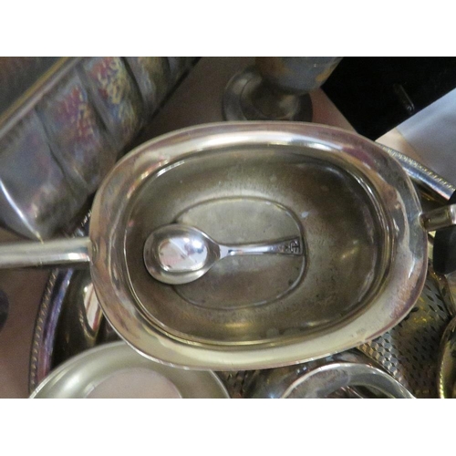 153 - A tray of assorted metal ware to include a three piece silver plated tea-service on tray