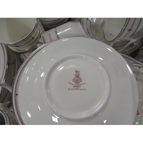 159 - A tray of Royal Doulton Infinity tea and dinner ware